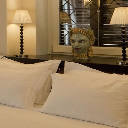 Villa Athena Resort Agrigento Ngoại thất bức ảnh A bedroom at the hotel